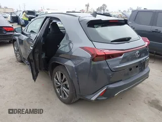 2023 Lexus UX 250h F Sport z VIN JTHB6JBH9P2132431, wystawiony jako IAAI lot #42137625 z przebiegiem 15 923 mil mil oraz . Historia ofert i sprzedaży dostępna na DreamBid. Obrazek 3.