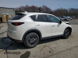 2021 Mazda CX-5 Touring z VIN JM3KFBCM9M1386068, wystawiony jako Copart lot #51735225 z przebiegiem 68 728 mil mil oraz Szkoda całkowita • Salvage title. Historia ofert i sprzedaży dostępna na DreamBid. Obrazek 3.