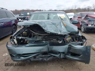 2003 Toyota Avalon XL with VIN 4T1BF28B73U272434, listed as a IAAI auction lot 42019673 with 231,796 mi miles and . Bid and sale history available at carsss.com. Image 13.