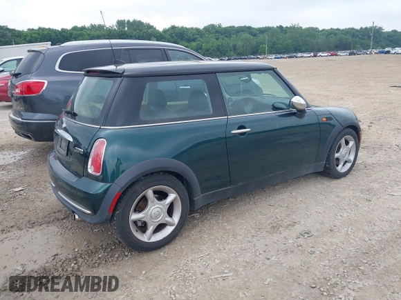 2006 MINI Hardtop with VIN WMWRC33566TK67977, listed as a IAAI auction lot 42538539 with 121,650 mi miles and . Bid and sale history available at DreamBid. Image 4.