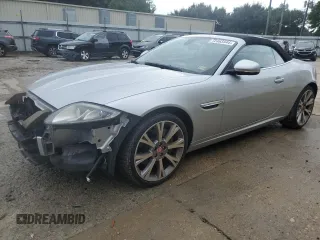 2014 Jaguar XK with VIN SAJWA4GB7ELB54429, listed as a Copart auction lot 72463344 with 72,711 mi miles and Salvage Title. Bid and sale history available at carsss.com. Image 1.