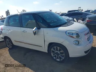 2014 FIAT 500L Lounge with VIN ZFBCFACH9EZ004041, listed as a IAAI auction lot 41366234 with 106,769 mi miles and . Bid and sale history available at DreamBid. Image 13.