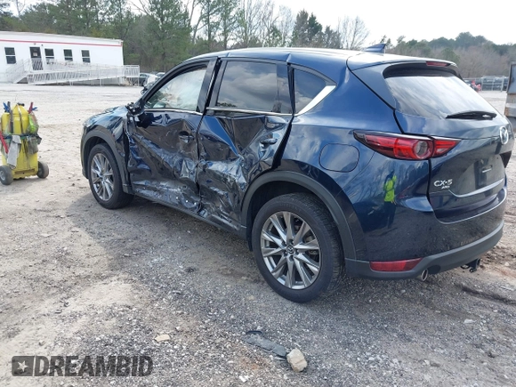 2021 Mazda CX-5 Grand Touring with VIN JM3KFBDM8M0484383, listed as a IAAI auction lot 41800786 with 58,617 mi miles. Bid and sale history available at carsss.com. Image 3.