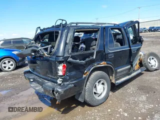 2000 Chevrolet Blazer LT with VIN 1GNDT13W8Y2280580, listed as a IAAI auction lot 41901975 with 236,736 mi miles and . Bid and sale history available at DreamBid. Image 4.