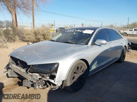 2011 Audi A8 z VIN WAURVAFD4BN020585, wystawiony jako IAAI lot #41841459 z przebiegiem 110 536 mil mil oraz . Historia ofert i sprzedaży dostępna na DreamBid. Obrazek 6.