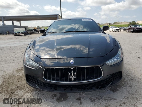 2016 Maserati Ghibli z VIN ZAM57XSAXG1174741, wystawiony jako Copart lot #51975655 z przebiegiem 127 182 mil mil oraz Tytuł czysty. Historia ofert i sprzedaży dostępna na DreamBid. Obrazek 5.