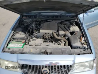 2005 Mercury Grand Marquis GS z VIN 2MEFM74W75X603444, wystawiony jako Copart lot #54395945 z przebiegiem 110 933 mil mil oraz Czysty tytuł • Clean title. Historia ofert i sprzedaży dostępna na DreamBid. Obrazek 11.