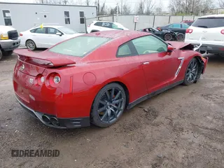 2015 Nissan GT-R Premium z VIN JN1AR5EFXFM280227, wystawiony jako IAAI lot #41920650 z przebiegiem 79 140 mil mil oraz . Historia ofert i sprzedaży dostępna na DreamBid. Obrazek 4.