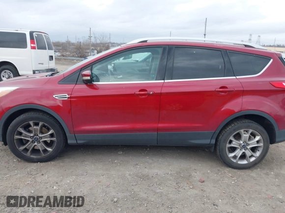 2016 Ford Escape Titanium with VIN 1FMCU9J92GUB13000, listed as a IAAI auction lot 41725258 with 66,817 mi miles. Bid and sale history available at carsss.com. Image 13.