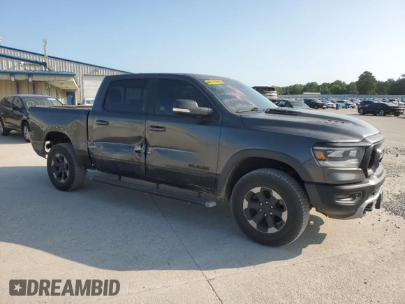 2020 Ram 1500 Rebel with VIN 1C6SRFLT4LN144723, listed as a Copart auction lot 59843935 with 90,936 mi miles and Salvage title. Bid and sale history available at DreamBid. Image 4.