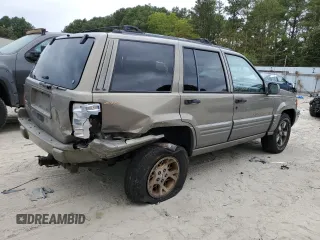 1997 Jeep Grand Cherokee Limited with VIN 1J4GZ78Y0VC599554, listed as a Copart auction lot 72006854 with 321,283 mi miles and Salvage Title. Bid and sale history available at carsss.com. Image 3.