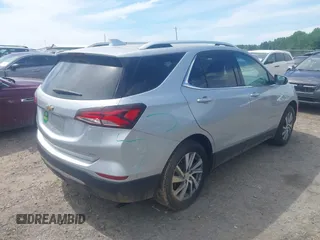 2022 Chevrolet Equinox Premier z VIN 2GNAXXEVXN6146327, wystawiony jako IAAI lot #42294870 z przebiegiem 68 276 mil mil oraz . Historia ofert i sprzedaży dostępna na DreamBid. Obrazek 4.