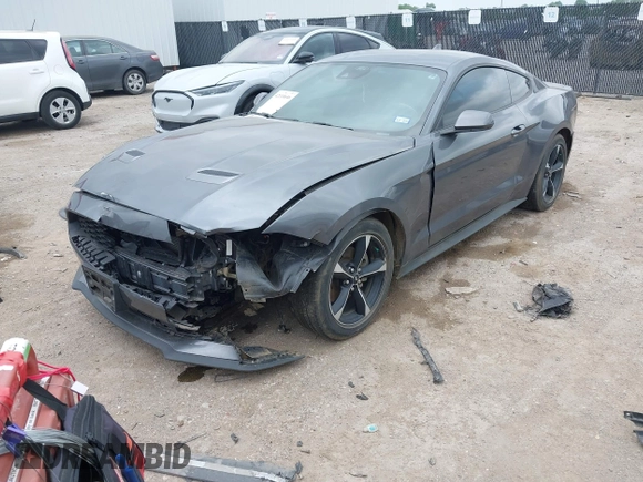 2021 Ford Mustang EcoBoost with VIN 1FA6P8TH1M5152941, listed as a IAAI auction lot 42110646 with 26,673 mi miles and . Bid and sale history available at DreamBid. Image 2.