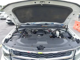 2015 Chevrolet Tahoe Commercial z VIN 1GNLC2EC1FR721538, wystawiony jako IAAI lot #42274601 z przebiegiem 138 991 mil mil oraz . Historia ofert i sprzedaży dostępna na DreamBid. Obrazek 10.
