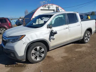 2020 Honda Ridgeline RTL with VIN 5FPYK3F50LB028430, listed as a IAAI auction lot 42033090 with Not provided miles and . Bid and sale history available at DreamBid. Image 17.