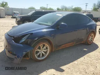 2023 Tesla Model Y Long Range z VIN 7SAYGDEEXPF616099, wystawiony jako Copart lot #53243235 z przebiegiem 41 730 mil mil oraz Szkoda całkowita • Salvage title. Historia ofert i sprzedaży dostępna na DreamBid. Obrazek 1.
