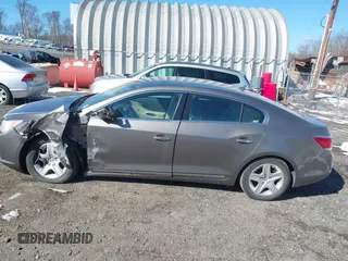 2011 Buick LaCrosse CX z VIN 1G4GA5ED7BF287630, wystawiony jako IAAI lot #41585309 z przebiegiem 132 872 mil mil oraz . Historia ofert i sprzedaży dostępna na DreamBid. Obrazek 14.
