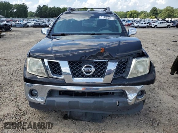 2011 Nissan Frontier SL with VIN 1N6AD0ERXBC440046, listed as a Copart auction lot 61645595 with 130,639 mi miles and Salvage title. Bid and sale history available at DreamBid. Image 5.