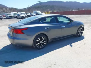 2017 Nissan Maxima SR with VIN 1N4AA6AP4HC453943, listed as a IAAI auction lot 41888527 with 130,577 mi miles and . Bid and sale history available at DreamBid. Image 4.
