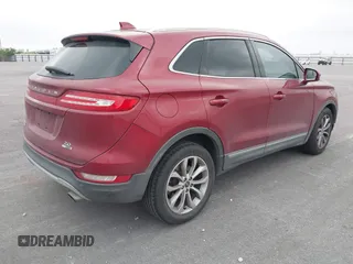 2015 Lincoln MKC with VIN 5LMCJ1A97FUJ30994, listed as a IAAI auction lot 42159219 with 180,802 mi miles. Bid and sale history available at carsss.com. Image 4.
