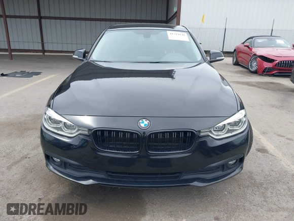 2018 BMW 3 Series 320i with VIN WBA8E1G54JNU93257, listed as a IAAI auction lot 41719141 with 144,381 mi miles. Bid and sale history available at carsss.com. Image 12.
