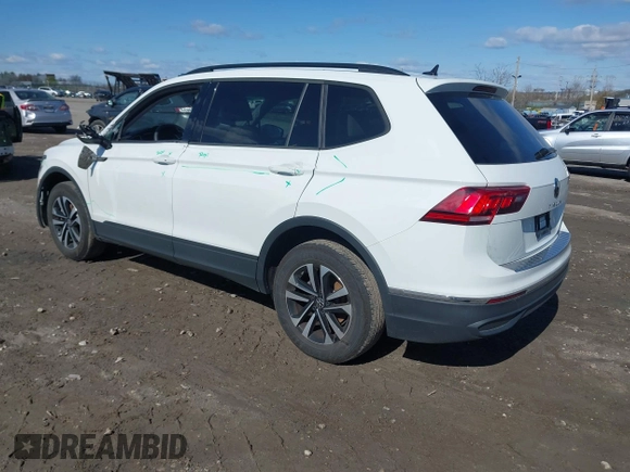 2024 Volkswagen Tiguan S with VIN 3VVFB7AX7RM063715, listed as a IAAI auction lot 41974650 with 23,374 mi miles and . Bid and sale history available at DreamBid. Image 3.