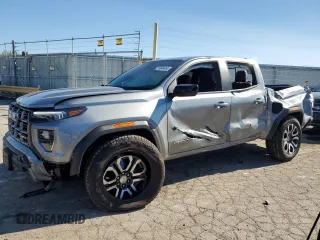 2024 GMC Canyon 4WD AT4 with VIN 1GTP6DEK8R1264699, listed as a Copart auction lot 76604464 with 2,406 mi miles and Salvage Title. Bid and sale history available at carsss.com. Image 1.