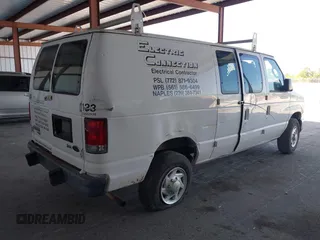 2014 Ford Econoline Cargo Commercial with VIN 1FTNE2EW3EDA31341, listed as a IAAI auction lot 42148317 with 146,158 mi miles and . Bid and sale history available at carsss.com. Image 4.