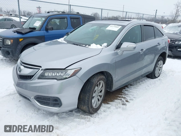 2017 Acura RDX w/Technology Pkg with VIN 5J8TB4H58HL031488, listed as a IAAI auction lot 41274882 with 124,066 mi miles. Bid and sale history available at carsss.com. Image 2.