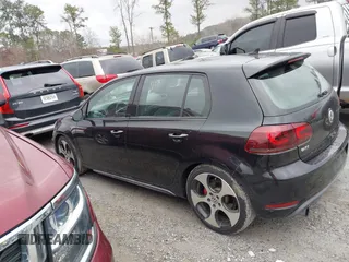 2012 Volkswagen GTI Autobahn z VIN WVWGV7AJ1CW157893, wystawiony jako IAAI lot #41623098 z przebiegiem 148 430 mil mil oraz . Historia ofert i sprzedaży dostępna na DreamBid. Obrazek 14.
