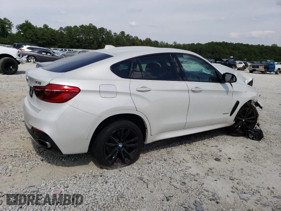2019 BMW X6 xDrive35i with VIN 5UXKU2C52K0Z64679, listed as a Copart auction lot 69003673 with Not Provided miles. Bid and sale history available at carsss.com. Image 3.