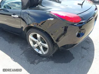 2007 Pontiac Solstice with VIN 1G2MB35B07Y105757, listed as a IAAI auction lot 42008293 with 135,739 mi miles. Bid and sale history available at carsss.com. Image 6.