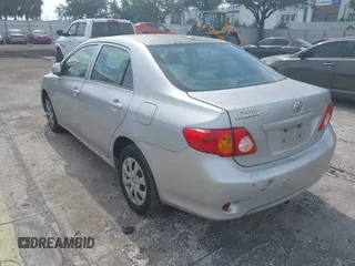 2010 Toyota Corolla with VIN 1NXBU4EE5AZ362534, listed as a IAAI auction lot 42096447 with 195,470 mi miles. Bid and sale history available at carsss.com. Image 3.