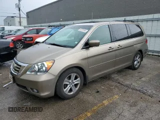 2009 Honda Odyssey Touring с VIN 5FNRL38929B048214, выставлен на аукционе Copart как лот 56735165 с пробегом 158 532 миль миль и Чистый • Clean title. История ставок и продаж доступна на DreamBid. Изображение 1.