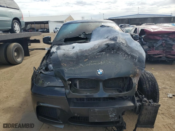 2011 BMW X6 M with VIN 5YMGZ0C54BLK13876, listed as a Copart auction lot 68567774 with 0 mi miles and Salvage Title. Bid and sale history available at carsss.com. Image 5.