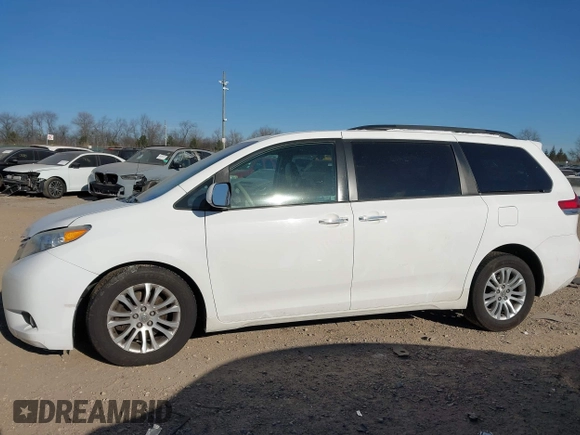 2013 Toyota Sienna XLE AAS with VIN 5TDYK3DC3DS308298, listed as a IAAI auction lot 41292280 with 165,638 mi miles and . Bid and sale history available at DreamBid. Image 14.