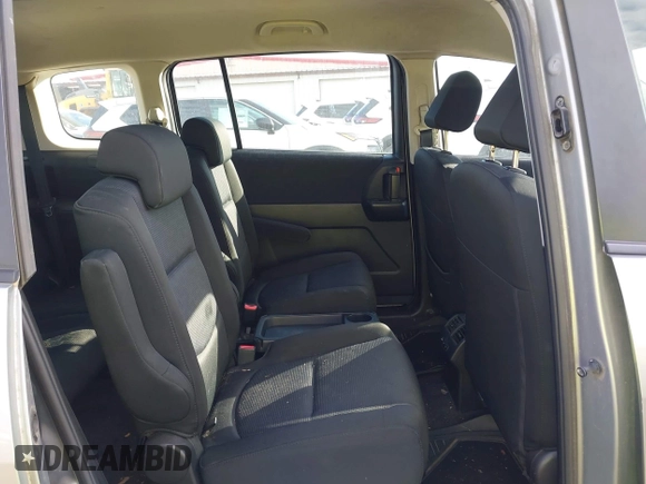 2010 Mazda 5 Sport with VIN JM1CR2W36A0388353, listed as a IAAI auction lot 42121004 with 169,658 mi miles. Bid and sale history available at carsss.com. Image 8.