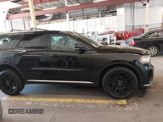 2016 Dodge Durango Limited with VIN 1C4RDJDG5GC433329, listed as a IAAI auction lot 42179512 with 153,648 mi miles and . Bid and sale history available at DreamBid. Image 13.