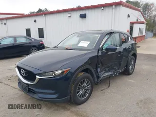 2017 Mazda CX-5 Touring with VIN JM3KFBCL9H0163449, listed as a IAAI auction lot 41919020 with 102,898 mi miles. Bid and sale history available at carsss.com. Image 17.