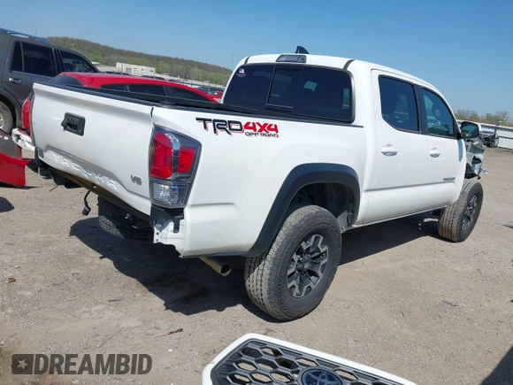 2023 Toyota Tacoma SR z VIN 3TYCZ5AN5PT151681, wystawiony jako IAAI lot #41936577 z przebiegiem 30 056 mil mil oraz . Historia ofert i sprzedaży dostępna na DreamBid. Obrazek 4.