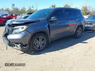 2019 Honda Passport EX-L with VIN 5FNYF7H54KB000467, listed as a IAAI auction lot 41342341 with 172,811 mi miles and . Bid and sale history available at carsss.com. Image 2.