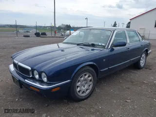 1998 Jaguar XJ with VIN SAJHX124XWC844575, listed as a IAAI auction lot 41951600 with 97,458 mi miles. Bid and sale history available at carsss.com. Image 2.