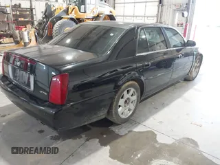 2002 Cadillac DeVille DTS with VIN 1G6KF579X2U141648, listed as a IAAI auction lot 42059624 with 179,338 mi miles. Bid and sale history available at carsss.com. Image 4.