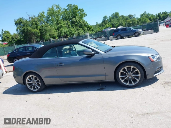 2014 Audi A5 Premium Plus z VIN WAULFAFH0EN003941, wystawiony jako IAAI lot #42406249 z przebiegiem 120 501 mil mil oraz . Historia ofert i sprzedaży dostępna na DreamBid. Obrazek 13.