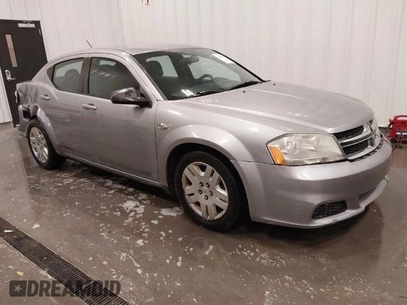 2014 Dodge Avenger SE with VIN 1C3CDZAB4EN148429, listed as a IAAI auction lot 41687320 with 149,084 mi miles and . Bid and sale history available at DreamBid. Image 1.