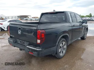 2017 Honda Ridgeline RTL-T with VIN 5FPYK2F64HB003542, listed as a IAAI auction lot 42171243 with 102,071 mi miles and . Bid and sale history available at DreamBid. Image 4.