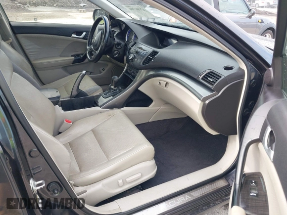 2012 Acura TSX with VIN JH4CU2F45CC016817, listed as a IAAI auction lot 42104700 with 148,617 mi miles. Bid and sale history available at carsss.com. Image 5.