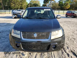 2007 Suzuki Grand Vitara z VIN JS3TE941674200553, wystawiony jako Copart lot #75667344 z przebiegiem 177 312 mil mil oraz Szkoda całkowita • Salvage title. Historia ofert i sprzedaży dostępna na DreamBid. Obrazek 5.