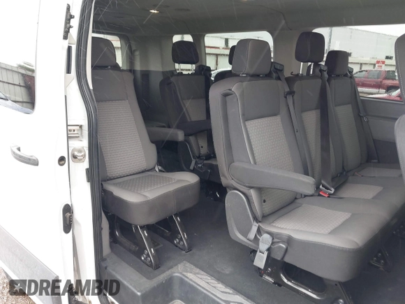2023 Ford Transit Passenger XL with VIN 1FBAX2YG2PKA91028, listed as a IAAI auction lot 42106198 with 52,874 mi miles. Bid and sale history available at carsss.com. Image 8.