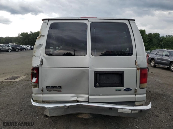 2009 Ford Econoline Wagon XL with VIN 1FBNE31L79DA56223, listed as a Copart auction lot 65554344 with 260,919 mi miles and Salvage Title. Bid and sale history available at carsss.com. Image 6.
